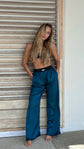 Silk trousers in the shade of "Berlin Azure