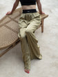 Silk trousers in olive green