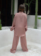 Silk suit in the color of a copper coin