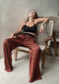 Silk trousers in a rich mahogany hue