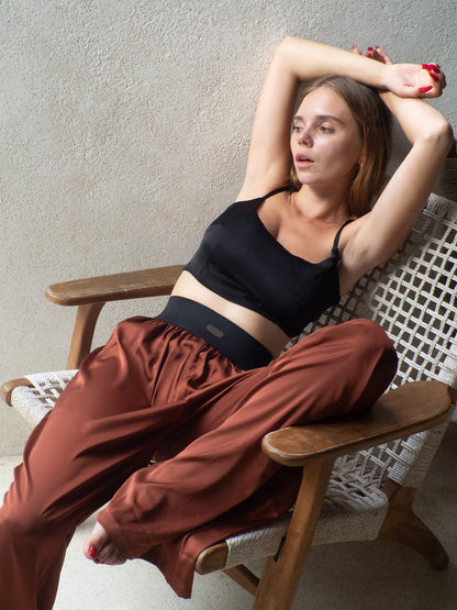 Silk trousers in a rich mahogany hue